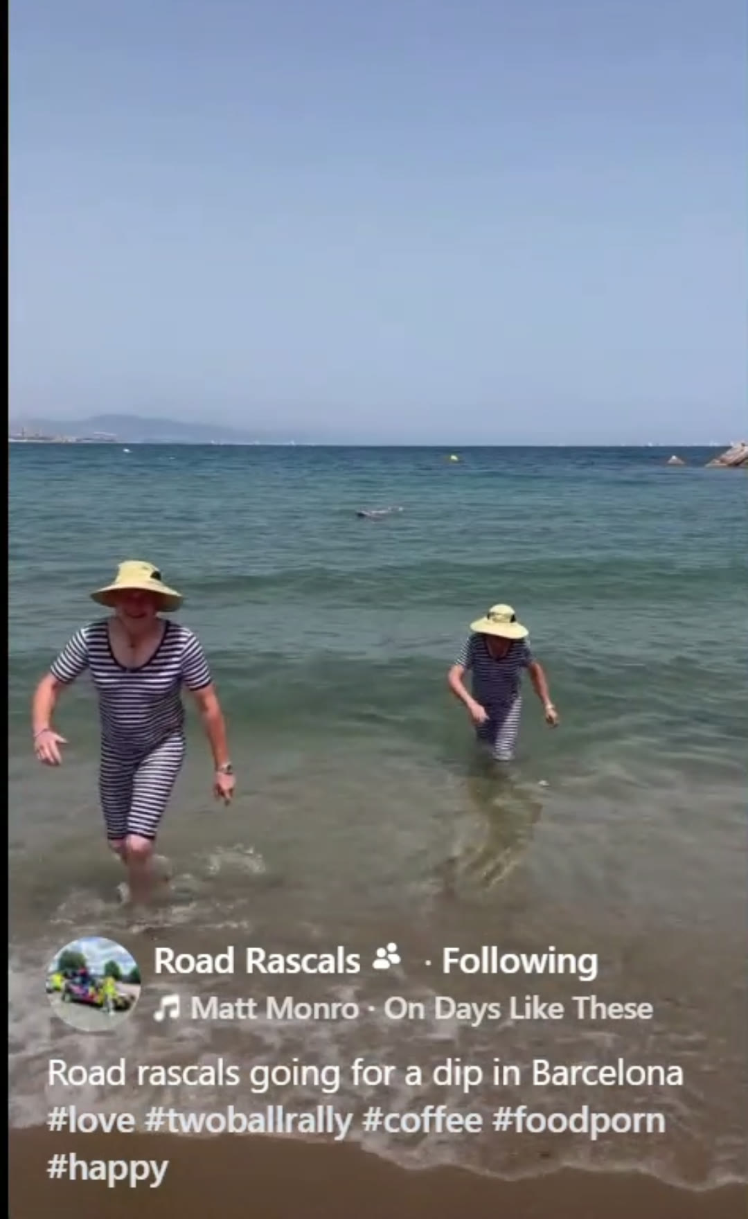The crew wading into the sea in Barcelona